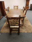 A good quality oak refectory dining room table and six chairs,