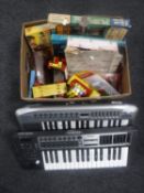 A box of mid 20th century puzzles and toys,