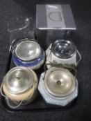 A tray of four china biscuit barrels,