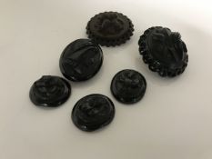 A bag of six Whitby jet brooches