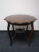 A shaped mahogany occasional table
