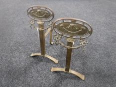 A pair of Victorian brass fire dogs
