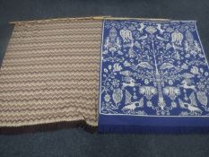 A tree of life wall hanging and one other