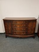 A mahogany bowfront sideboard,