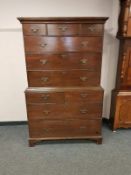 A George III oak chest on chest fitted ten drawers,