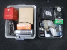 Two boxes of camera equipment, projector,