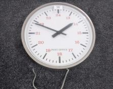 An electric Post Office wall clock