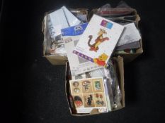 Three boxes of cross stitch books and equipment