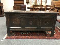 A George III panelled oak coffer,
