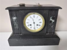A Victorian slate and marble mantel clock with enamel dial,