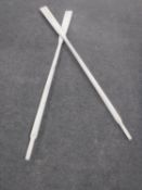 A pair of vintage wooden boat oars