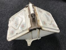 An antique Godin enamelled coal receiver