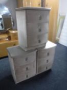 Three dralon three drawer bedside chests
