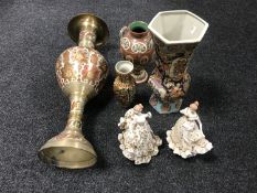 An Eastern brass vase, pair of Leonardo figures,