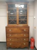 A George III inlaid mahogany secretaire bookcase, with later astragal glazed top,