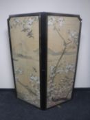 An ebonised Chinese two-fold screen