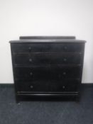 A 1930's oak four drawer chest