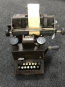 An early 20th century Dalton Aving Listing Calculating machine