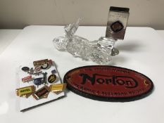 Motorcycle memorabilia to include a German glass motorcycle ornament, cast iron Norton plaque,