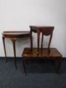 A mahogany D-shaped hall table together with a walnut pie crust edge coffee table and a