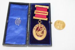 A gilt and enamelled Masonic Durham medal and a silver-gilt Masonic medallion
