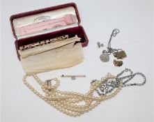 A boxed Waterman's Ideal yellow metal mounted fountain pen, together with a costume pearl necklace,