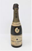 An antique bottle of Moet & Chandon champagne (brought back from France by the recipient of the