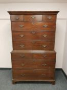 A George III oak chest on chest fitted ten drawers,
