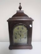 A German bracket clock on bun feet