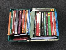 A box of Haynes car manuals,