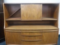 A 1970's teak sideboard