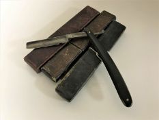 Three boxed vintage cut throat razors