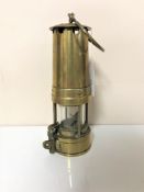 A brass miner's lamp