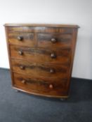 A Victorian mahogany bow fronted five drawer chest