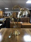A brass two way table lamp in the form of a palm tree