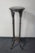 A reproduction mahogany barley twist torchere