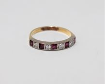 A diamond and ruby half eternity ring,