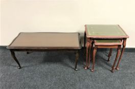 An inlaid mahogany glass topped coffee table together with a nest of three mahogany glass and