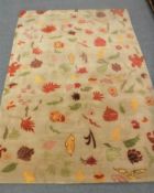 A hand-knotted rug of leaf design,