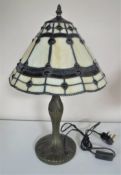 A Tiffany style table lamp with shade