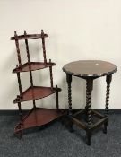 An early 20th century oak barley twist pie crust edge occasional table together with a four-tier