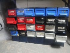 A metal twenty-four drawer work shop chest