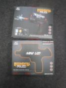 Two boxed Regimental Police mini uzi electric water pellet guns