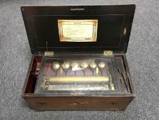 A 19th century inlaid rosewood Swiss cylinder music box CONDITION REPORT: Numerous