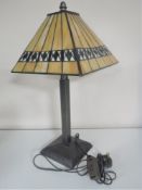 A Tiffany style table lamp with shade