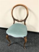 A Victorian mahogany balloon back chair
