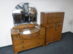 An oak Art Deco dressing table with matching linen chest