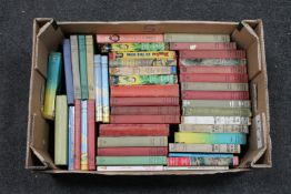 A box containing mid 20th century Biggles hardback books
