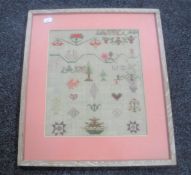 A 19th century framed alphabet sampler