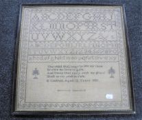 A Victorian framed alphabet sampler signed E.